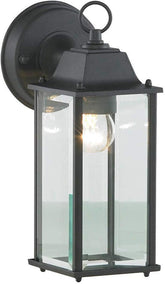 Black outdoor wall lantern with clear glass on a white background